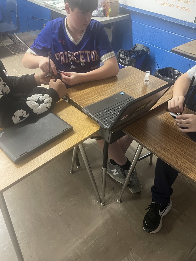 students trying out their bridges