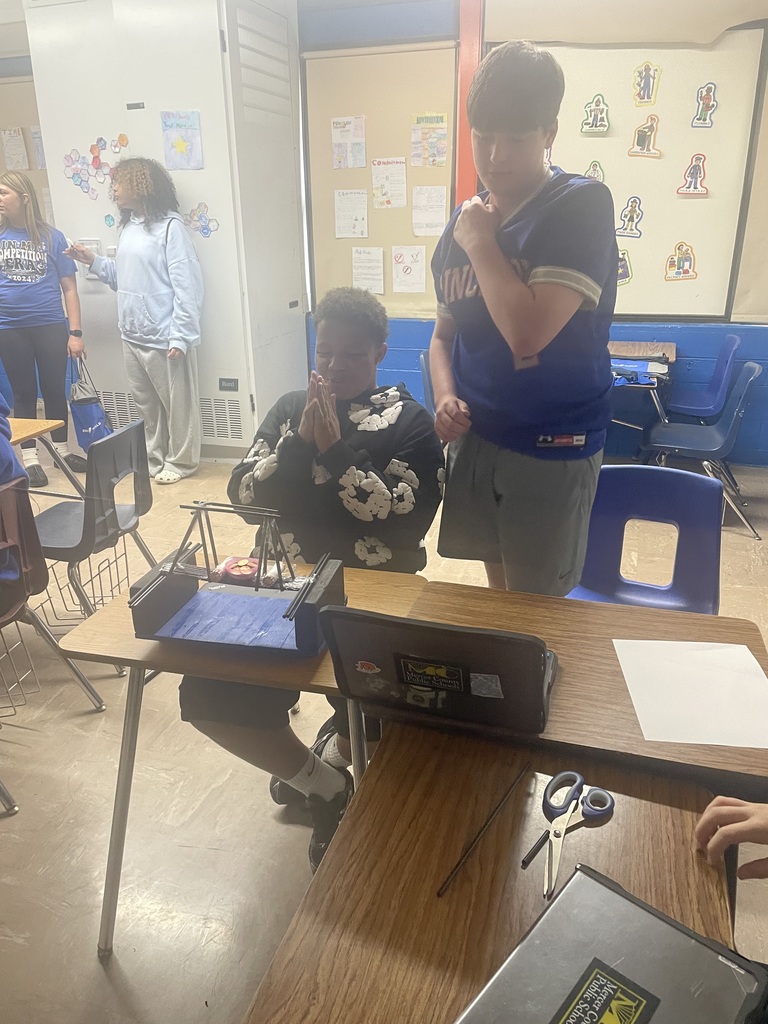 Students praying their creation works