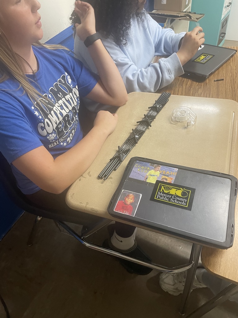 Students creating a bridge