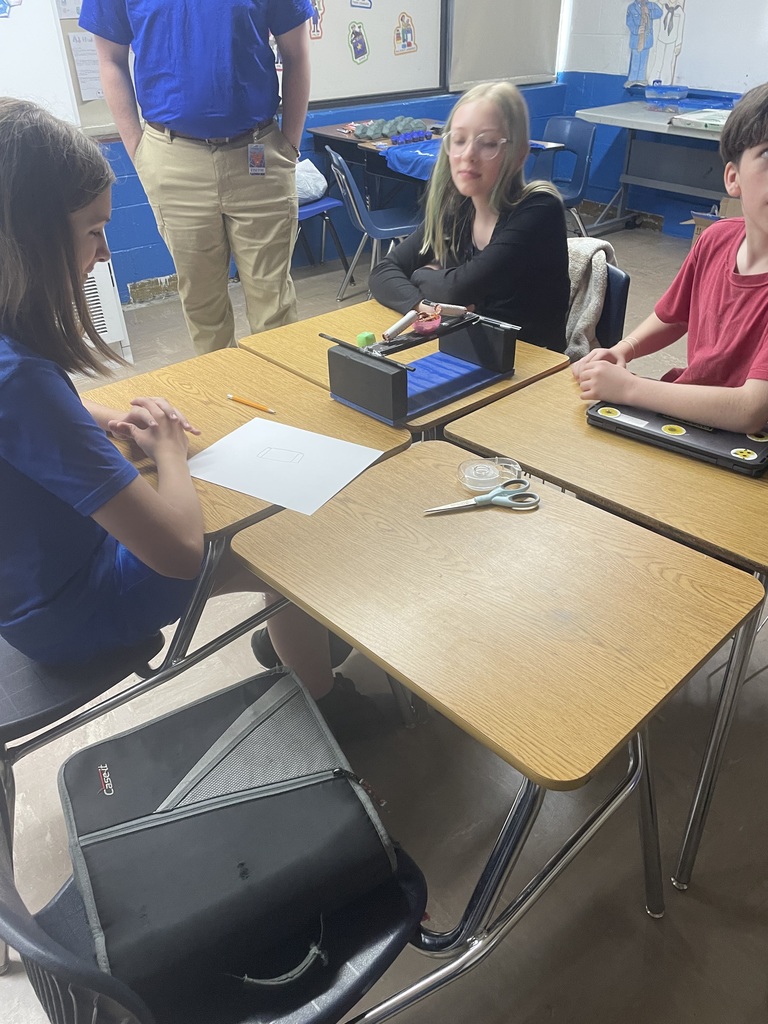 students trying out their bridges