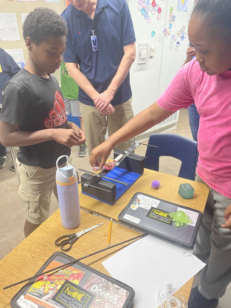 students trying out their bridges