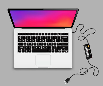 Picture of a laptop with a charger