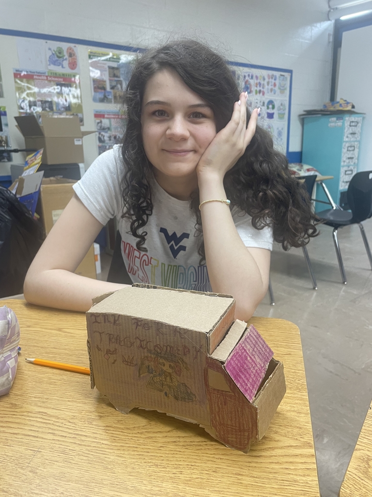 students with her creation