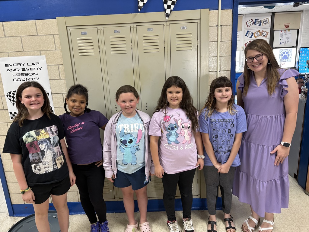 Straley staff and students wearing purple for Purple Up Day-showing support for our military students and their families.