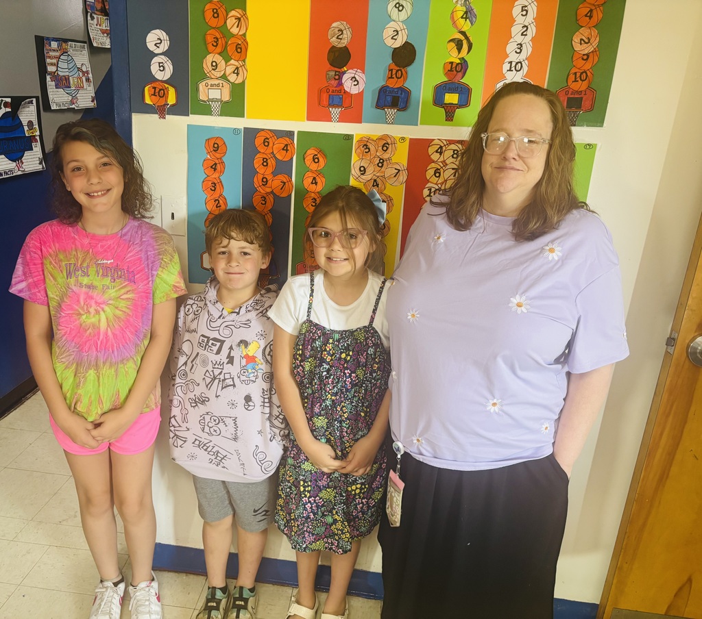 Straley staff and students wearing purple for Purple Up Day-showing support for our military students and their families.