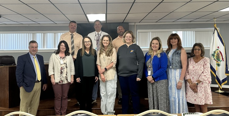 schools with zero audit findings for fy26. treasurer Leslie Wellman pictured with principals of those schools