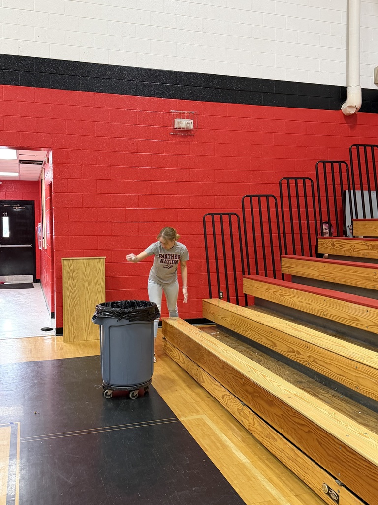 Students cleaning up bleachers at PVHS