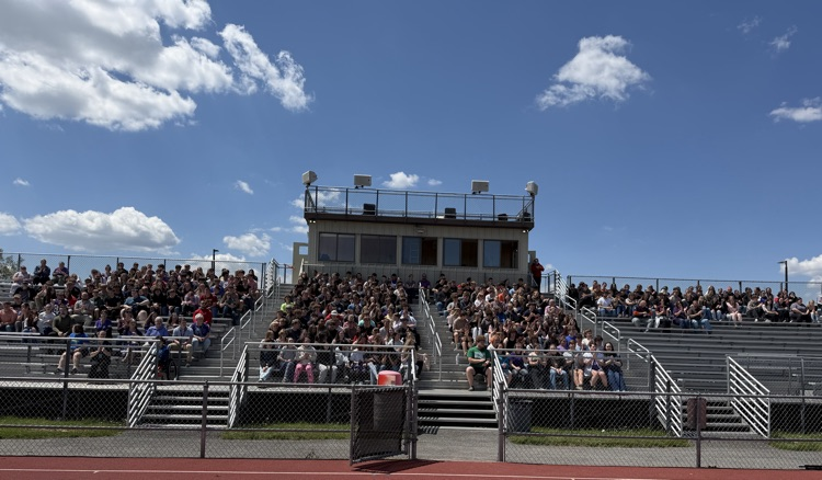 students gathered for the flag retirement ceremony