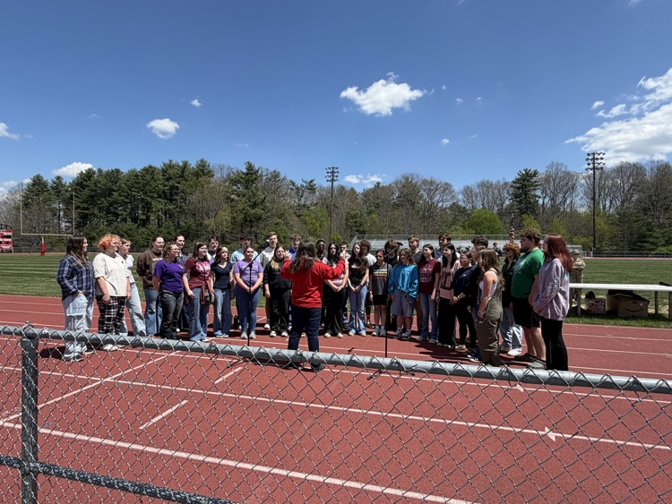 chorale performing the national anthem