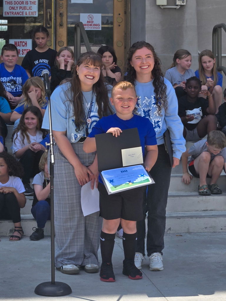 student receiving a certificate