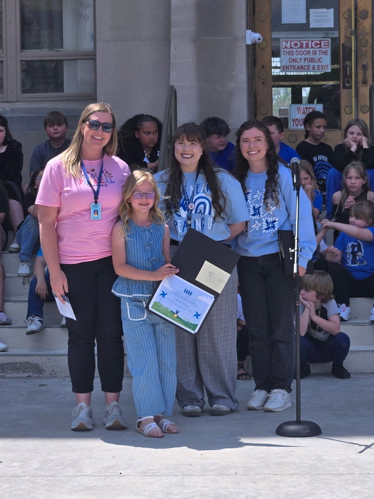 student receiving a certificate