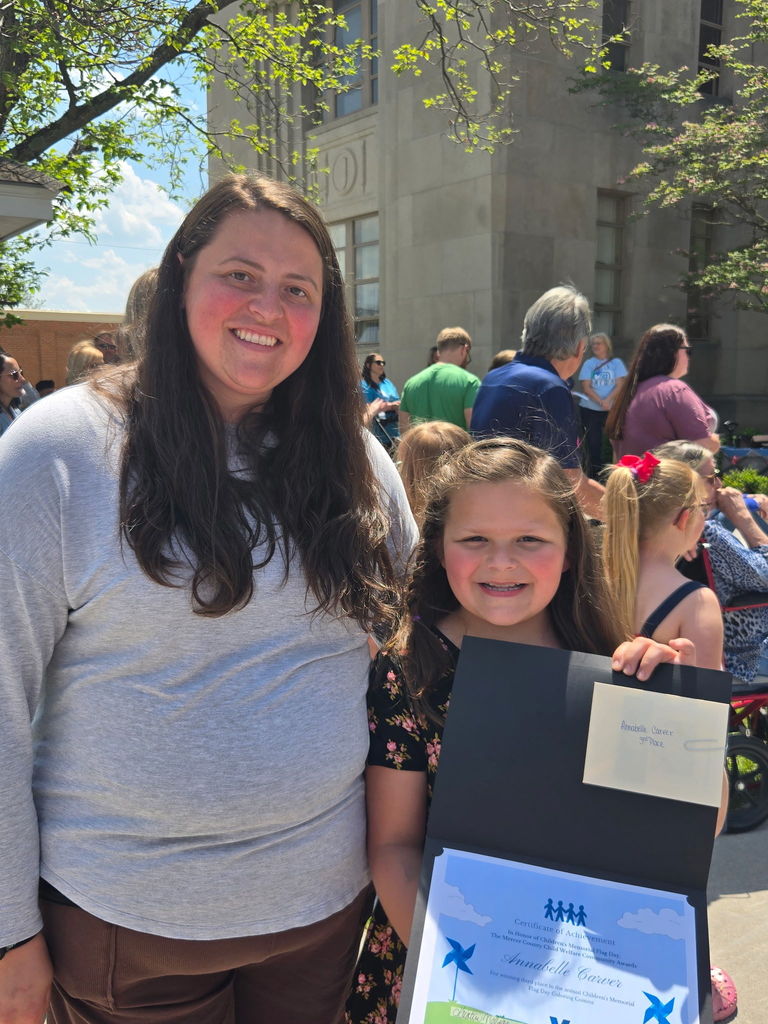 Student receiving certificate