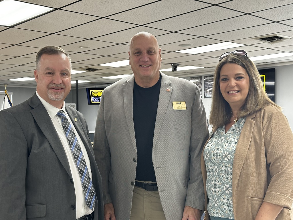 Assistant Superintendent Dr. Ernie Adkins, Superintendent Ed Toman, and McDowell County Assistant Superintendent Amanda Peyton