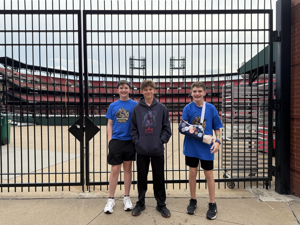 students in front of the stadium