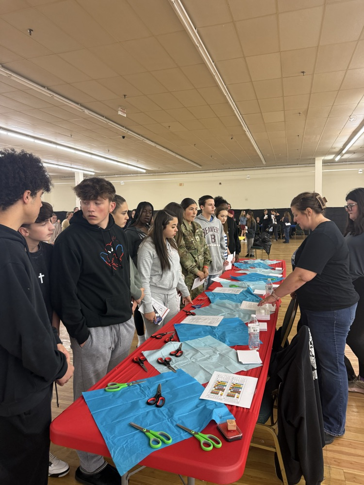 GEARUP Stem day at Mercer Mall. students engaged in STEM activities at multiple stations