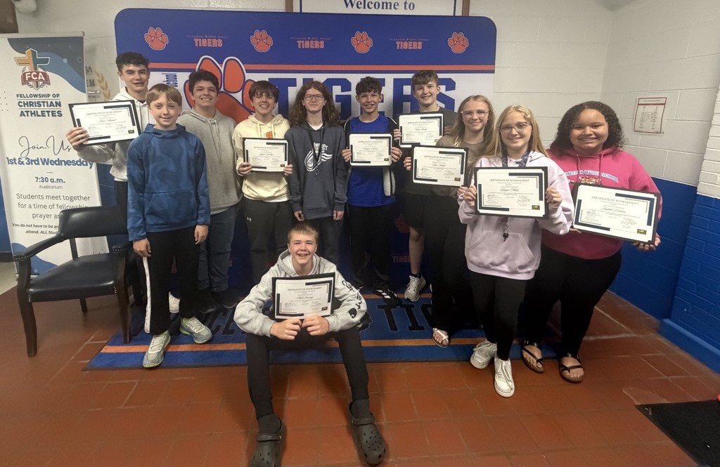 students showing offwards