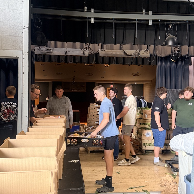 PVHS packing food for Mountaineer Food Bank.