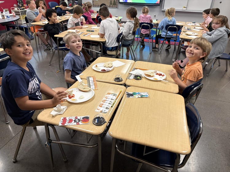 Second graders in Mrs. Fulp's class got to say "Cream cheese!" for these pictures. This week they have been reading, "Where on Earth is my Bagel?" They got to eat bagels with different toppings while listening to the story today! 