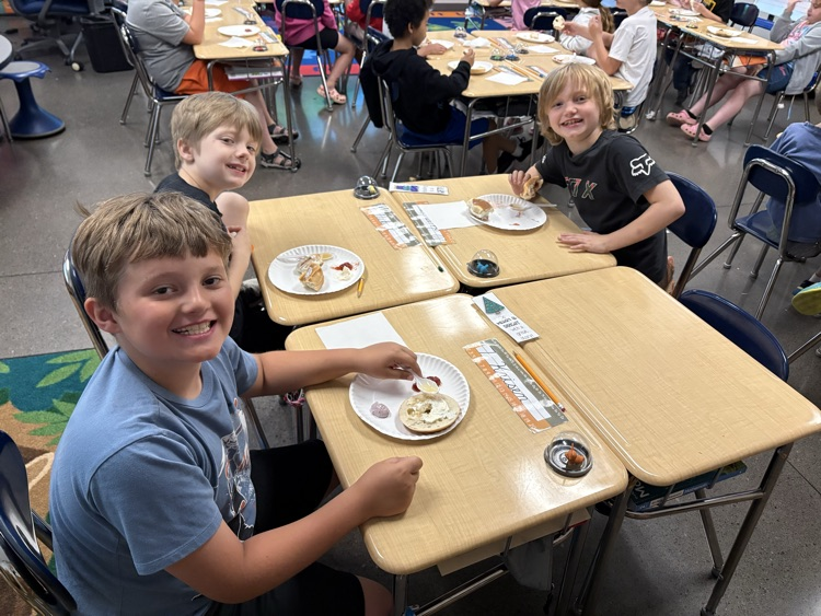 Second graders in Mrs. Fulp's class got to say "Cream cheese!" for these pictures. This week they have been reading, "Where on Earth is my Bagel?" They got to eat bagels with different toppings while listening to the story today! 