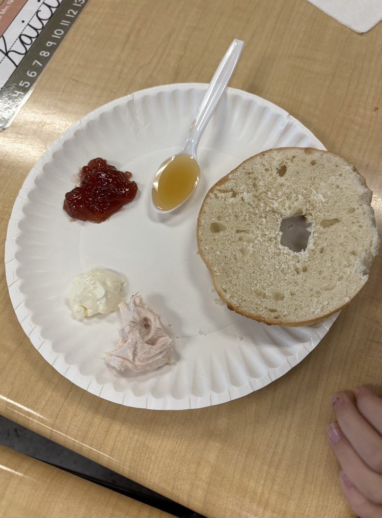 Second graders in Mrs. Fulp's class got to say "Cream cheese!" for these pictures. This week they have been reading, "Where on Earth is my Bagel?" They got to eat bagels with different toppings while listening to the story today! 