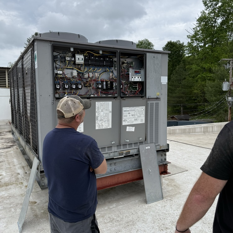 MCPS Maintenance Dept. working on MHS’s air conditioning  