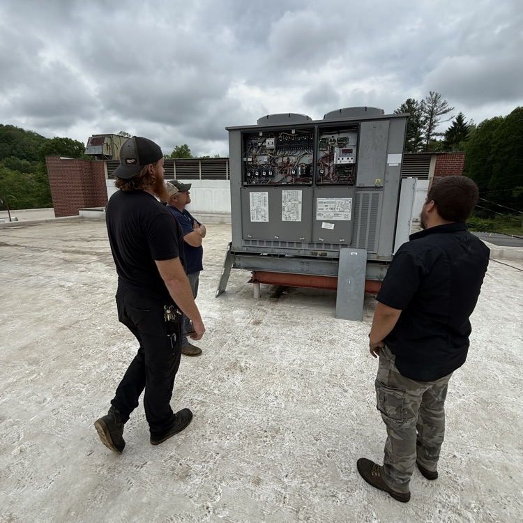 MCPS Maintenance Dept. working on MHS’s air conditioning
