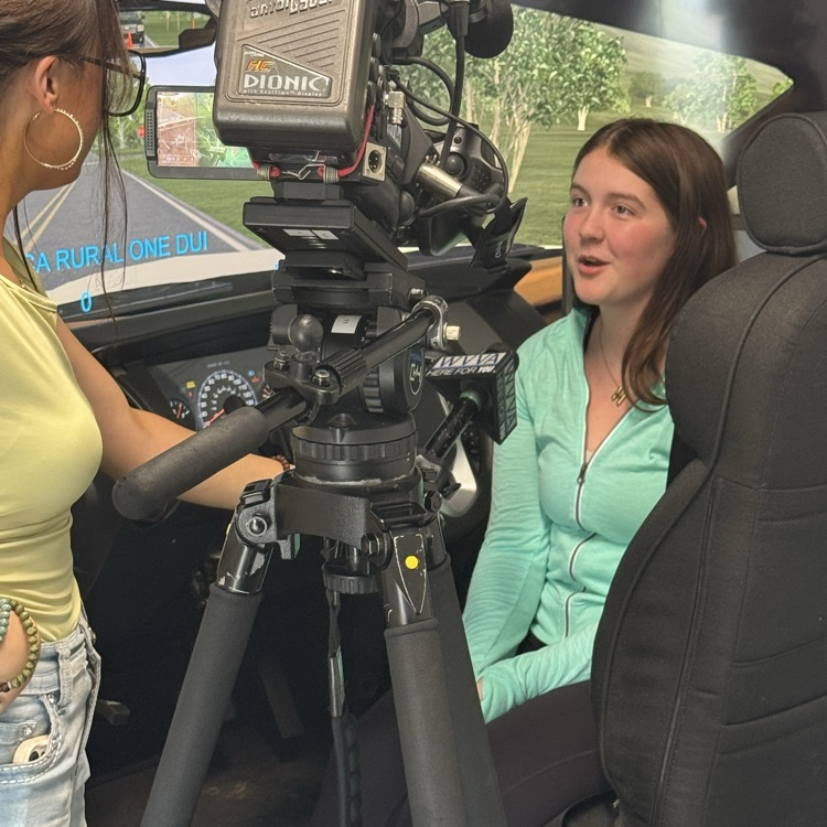 A BHS student being interviewed about the DUI simulator