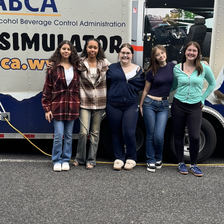 Students in front of the DUI simulator trailer