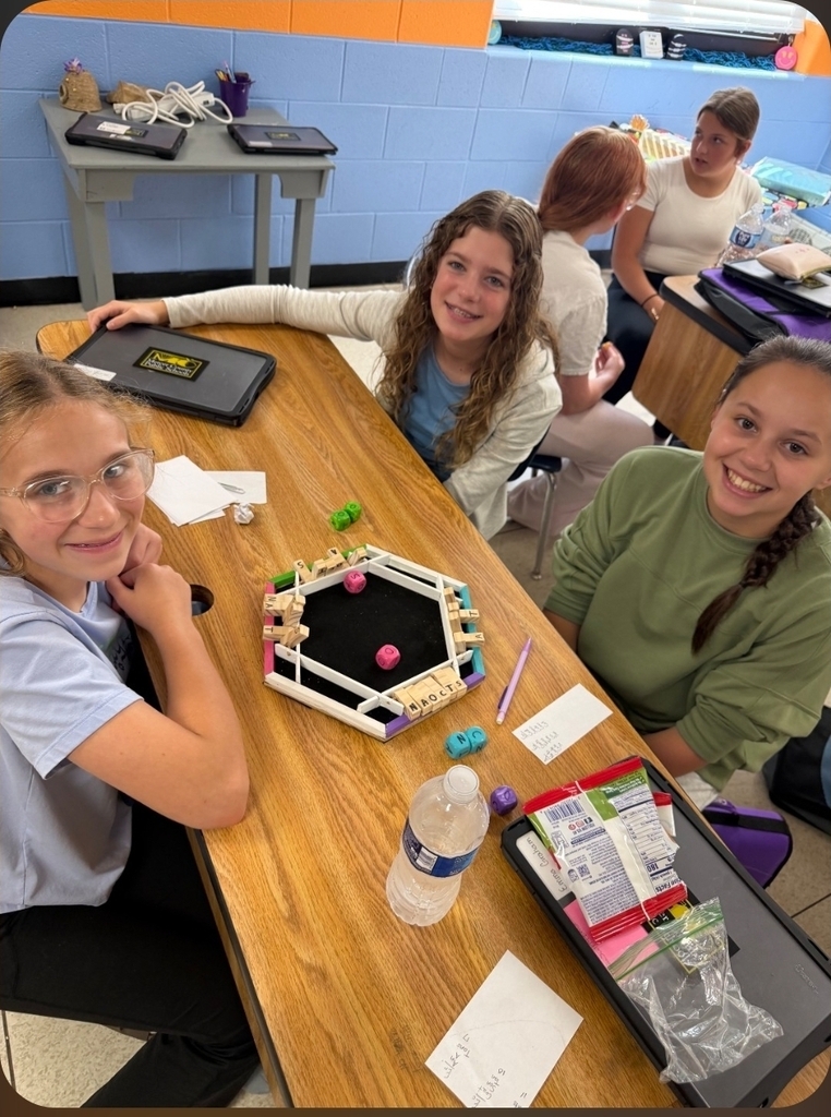 Students showing off their work