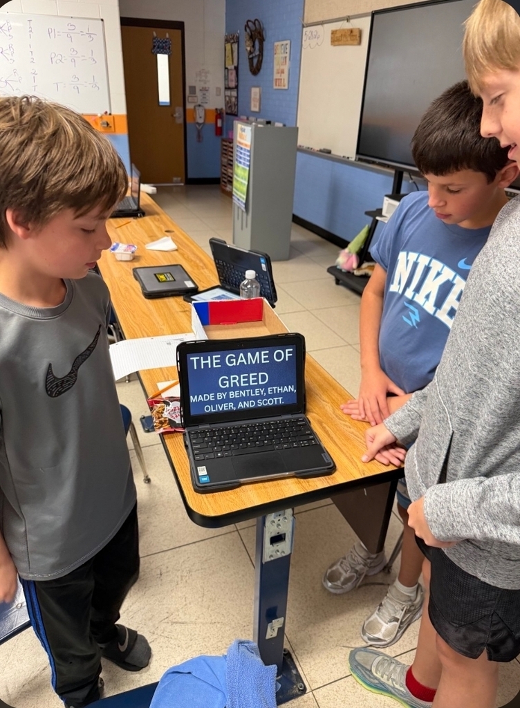 Students showing off their work