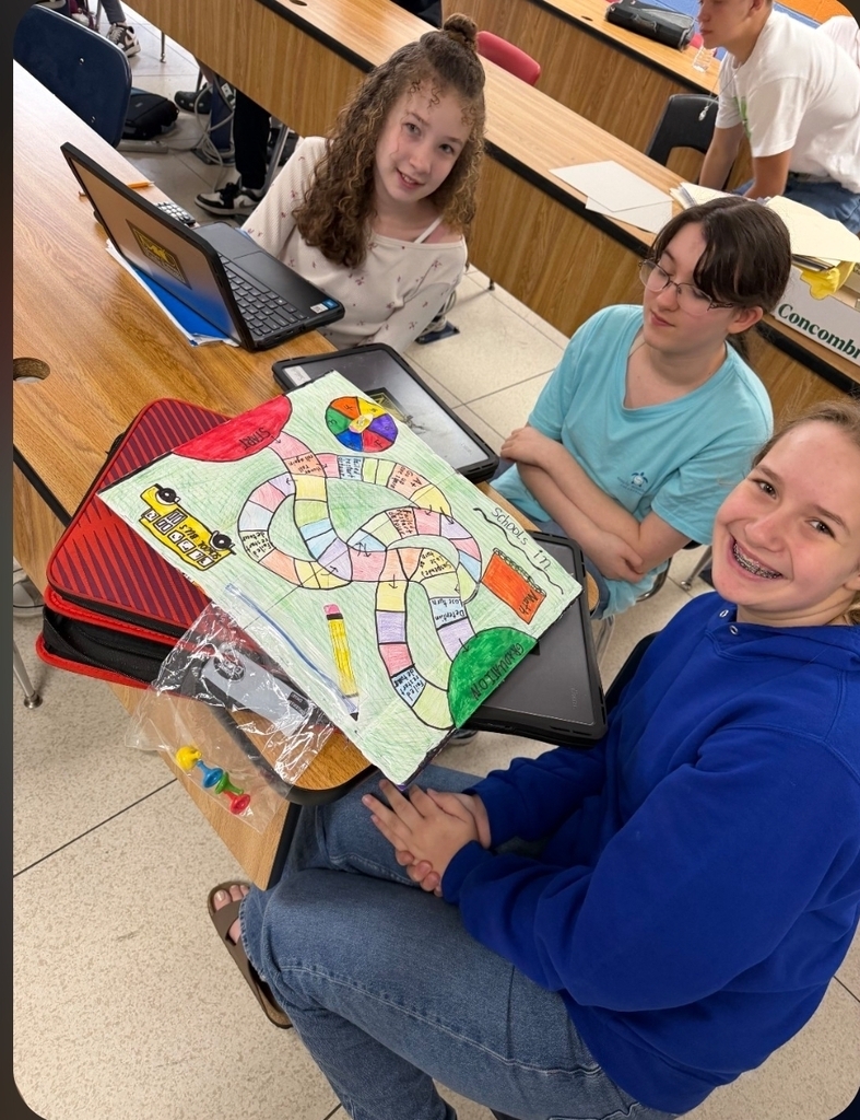 Students showing off their work