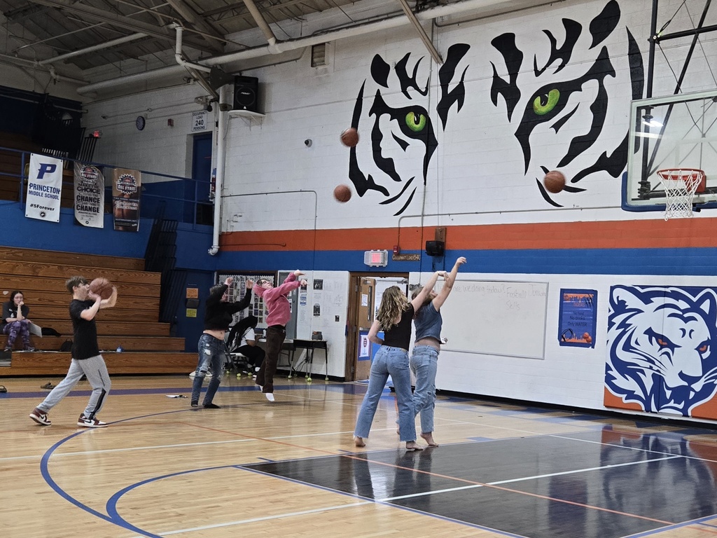 students playing basketball