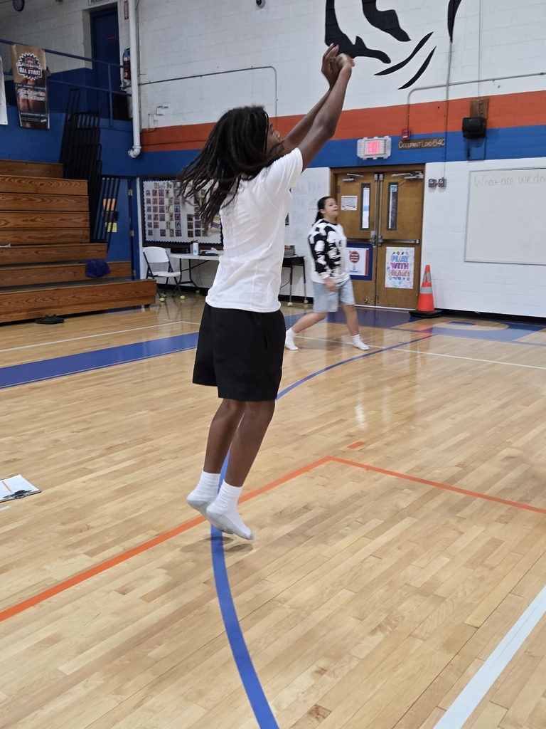 students playing basketball