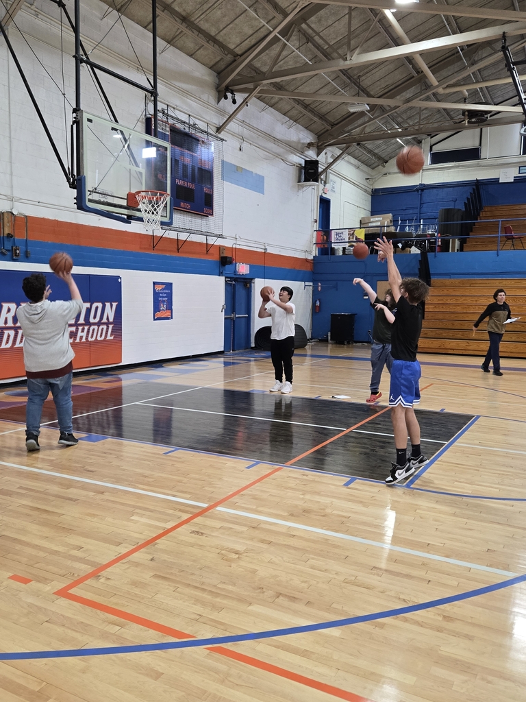 students playing basketball