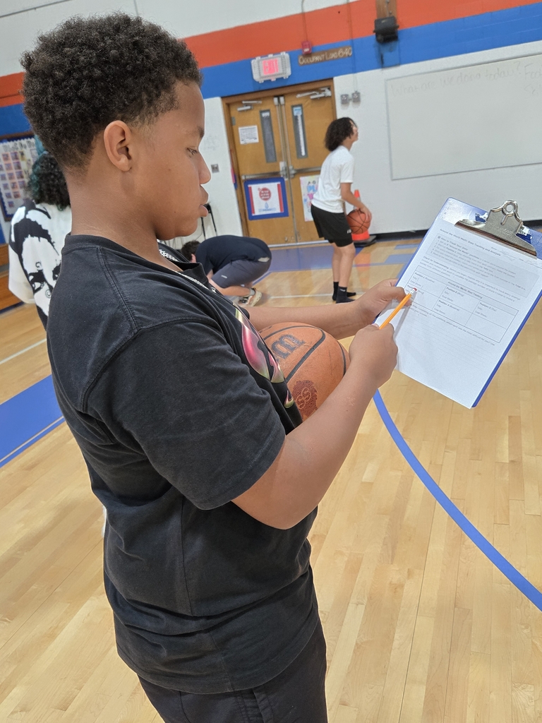 students playing basketball