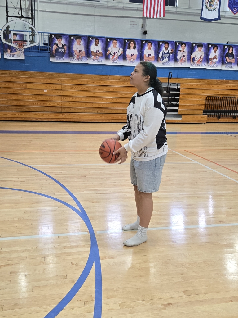 students playing basketball
