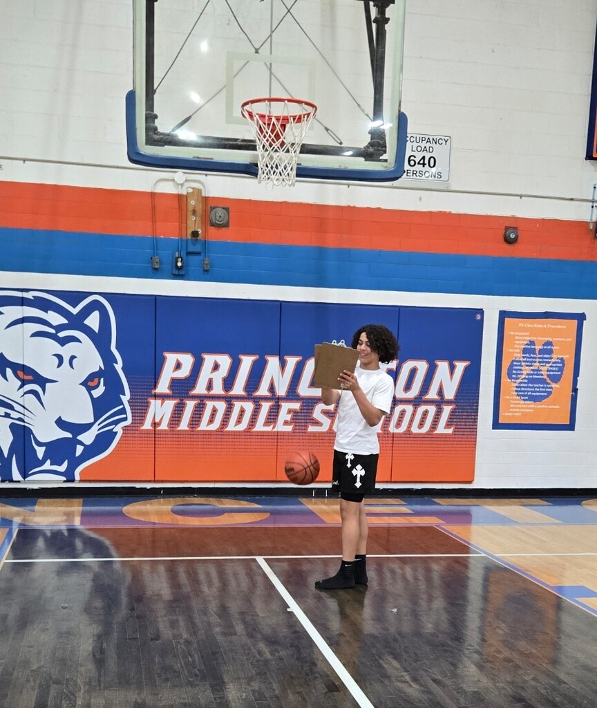 students playing basketball