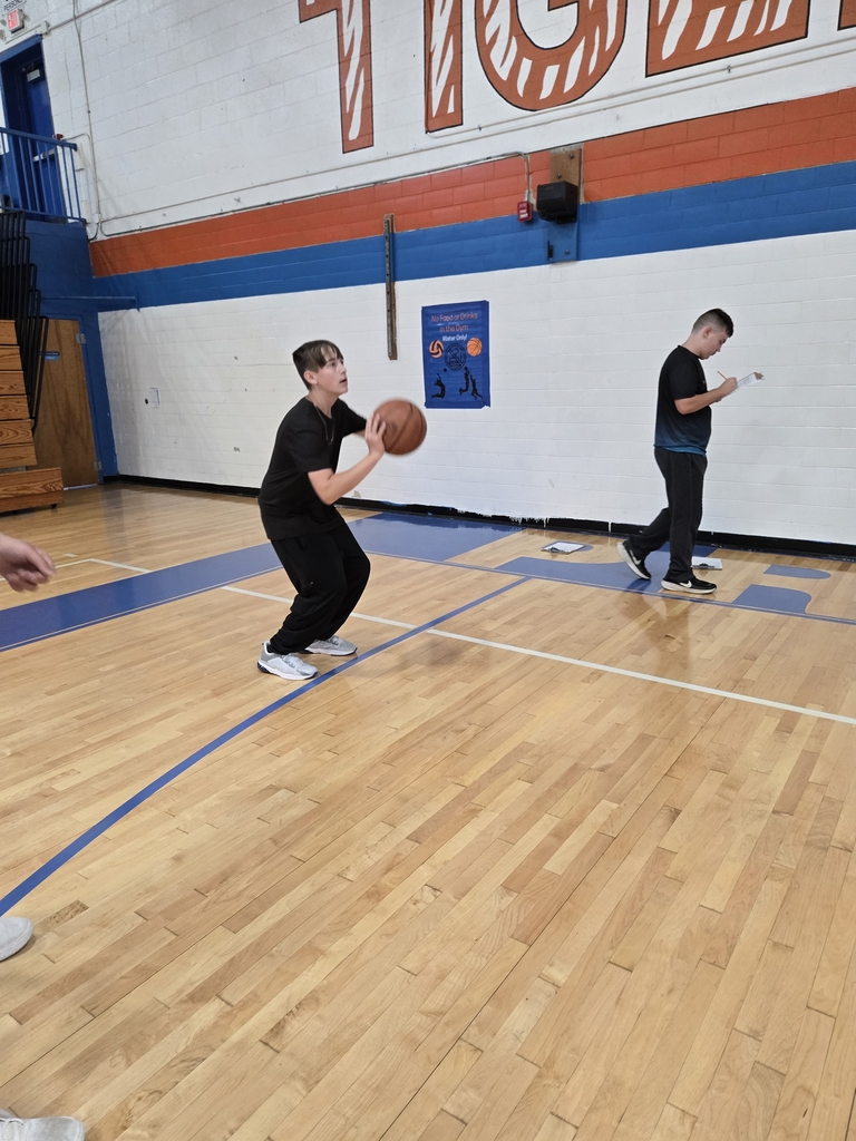 students playing basketball