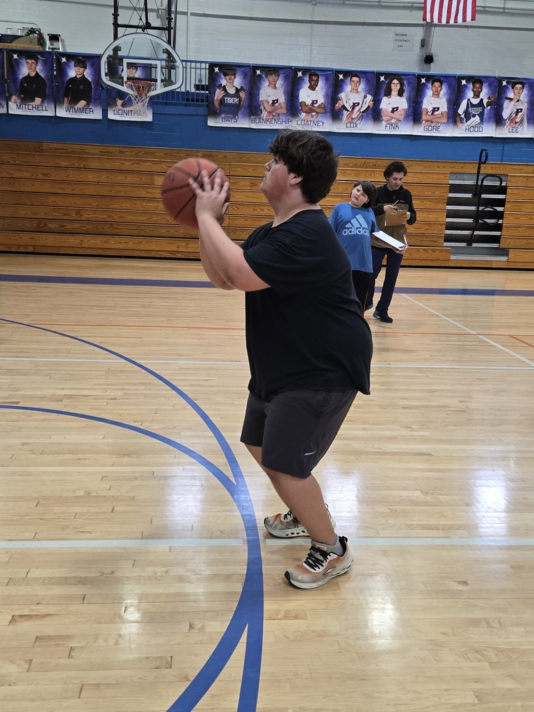 students playing basketball