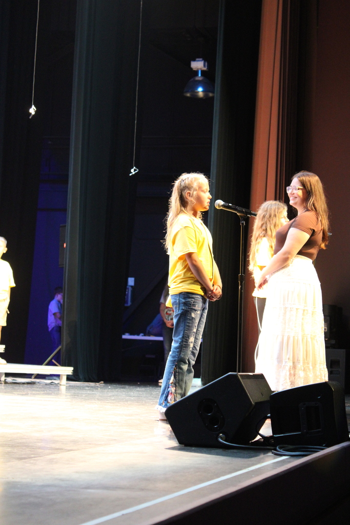 On Thursday, June 11, we had our end-of-year choir performance for grades 3, 4, and 5 at the Chuck Mathena Center.   The students, under the direction of Ms. Ana Barros, performed a beautiful medley of entertaining songs, many of which included choreography. Great job to all involved!  Enjoy looking through all the wonderful pictures from their performance.