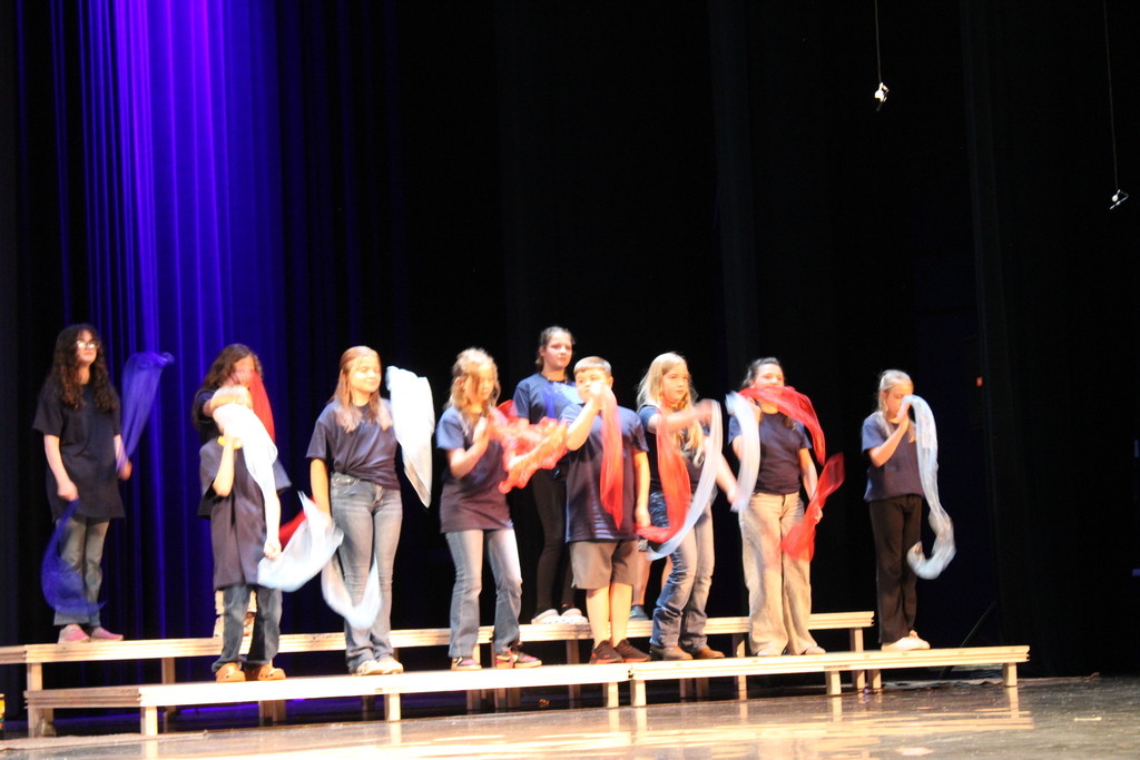 On Thursday, June 11, we had our end-of-year choir performance for grades 3, 4, and 5 at the Chuck Mathena Center.   The students, under the direction of Ms. Ana Barros, performed a beautiful medley of entertaining songs, many of which included choreography. Great job to all involved!  Enjoy looking through all the wonderful pictures from their performance.