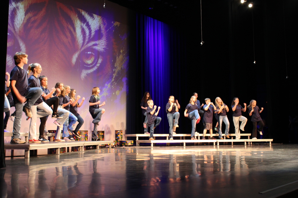 On Thursday, June 11, we had our end-of-year choir performance for grades 3, 4, and 5 at the Chuck Mathena Center.   The students, under the direction of Ms. Ana Barros, performed a beautiful medley of entertaining songs, many of which included choreography. Great job to all involved!  Enjoy looking through all the wonderful pictures from their performance.
