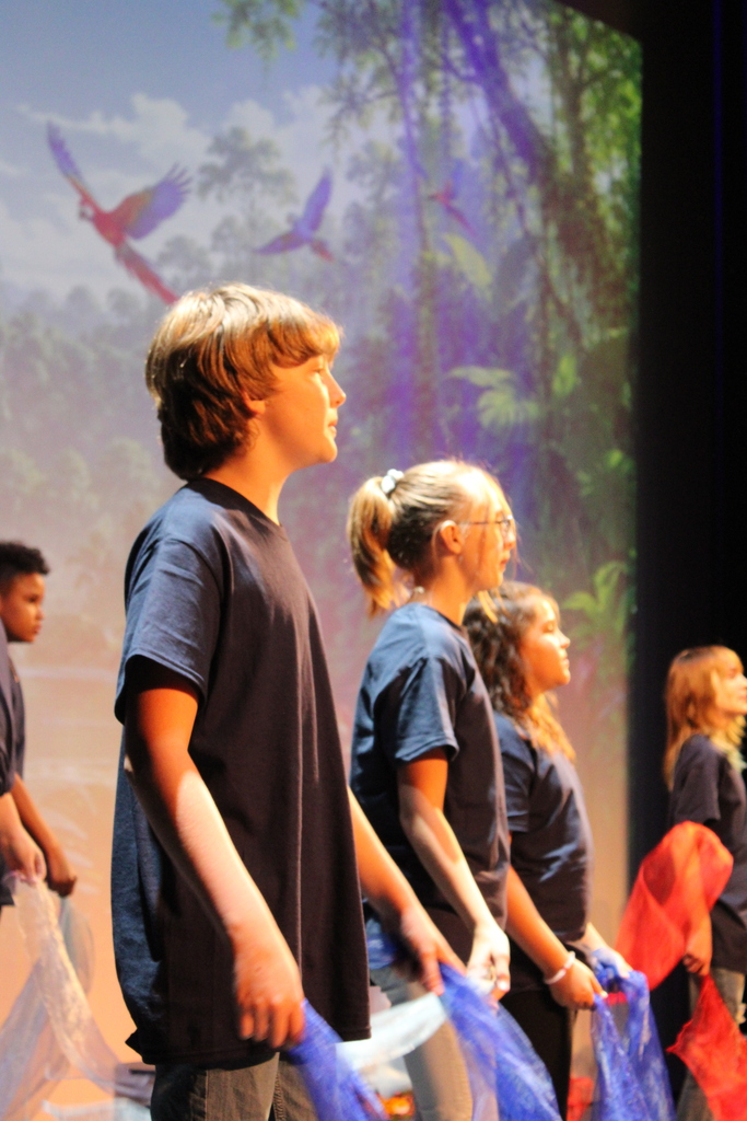 On Thursday, June 11, we had our end-of-year choir performance for grades 3, 4, and 5 at the Chuck Mathena Center.   The students, under the direction of Ms. Ana Barros, performed a beautiful medley of entertaining songs, many of which included choreography. Great job to all involved!  Enjoy looking through all the wonderful pictures from their performance.