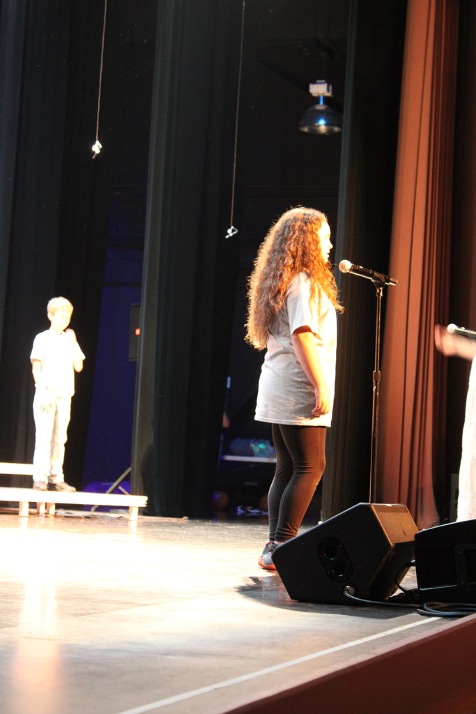 On Thursday, June 11, we had our end-of-year choir performance for grades 3, 4, and 5 at the Chuck Mathena Center.   The students, under the direction of Ms. Ana Barros, performed a beautiful medley of entertaining songs, many of which included choreography. Great job to all involved!  Enjoy looking through all the wonderful pictures from their performance.