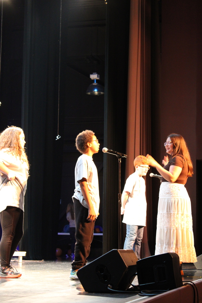 On Thursday, June 11, we had our end-of-year choir performance for grades 3, 4, and 5 at the Chuck Mathena Center.   The students, under the direction of Ms. Ana Barros, performed a beautiful medley of entertaining songs, many of which included choreography. Great job to all involved!  Enjoy looking through all the wonderful pictures from their performance.
