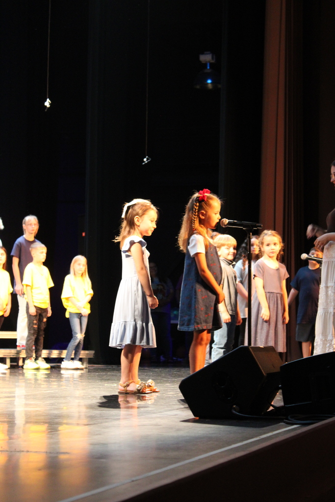 On Thursday, June 11, we had our end-of-year choir performance for grades 3, 4, and 5 at the Chuck Mathena Center.   The students, under the direction of Ms. Ana Barros, performed a beautiful medley of entertaining songs, many of which included choreography. Great job to all involved!  Enjoy looking through all the wonderful pictures from their performance.