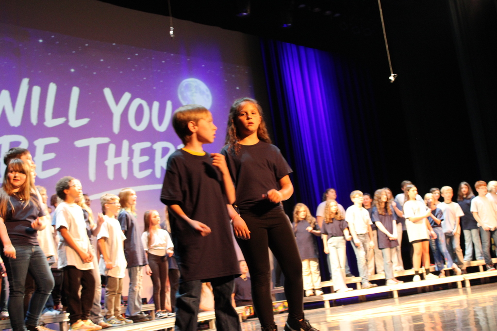 On Thursday, June 11, we had our end-of-year choir performance for grades 3, 4, and 5 at the Chuck Mathena Center.   The students, under the direction of Ms. Ana Barros, performed a beautiful medley of entertaining songs, many of which included choreography. Great job to all involved!  Enjoy looking through all the wonderful pictures from their performance.