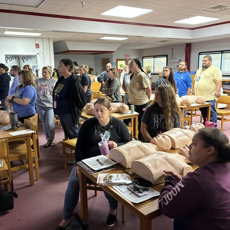 staff being trained in CPR  