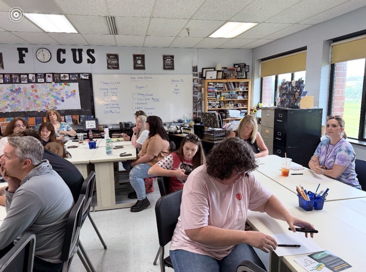 people in a classroom setting 