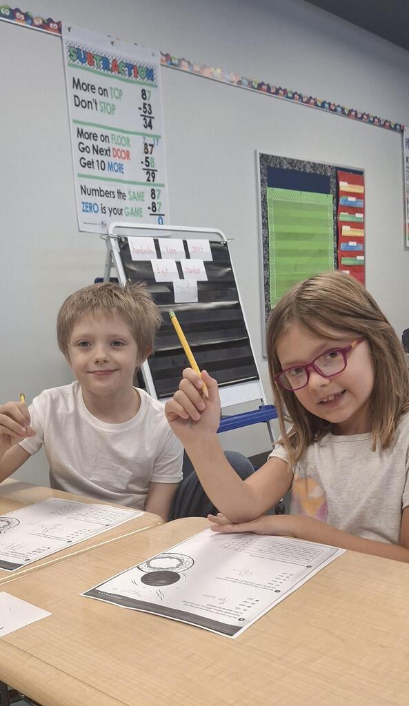 Two minds are better than one! Students in Mrs. Neal's 3rd grade class love working with a buddy.
